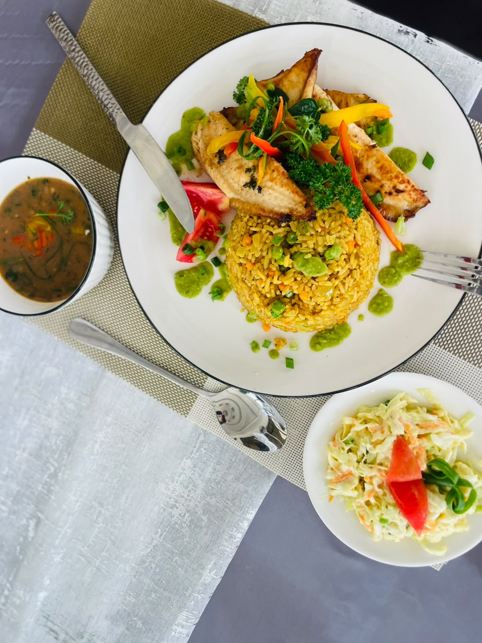 Chicken and rice plate with sides